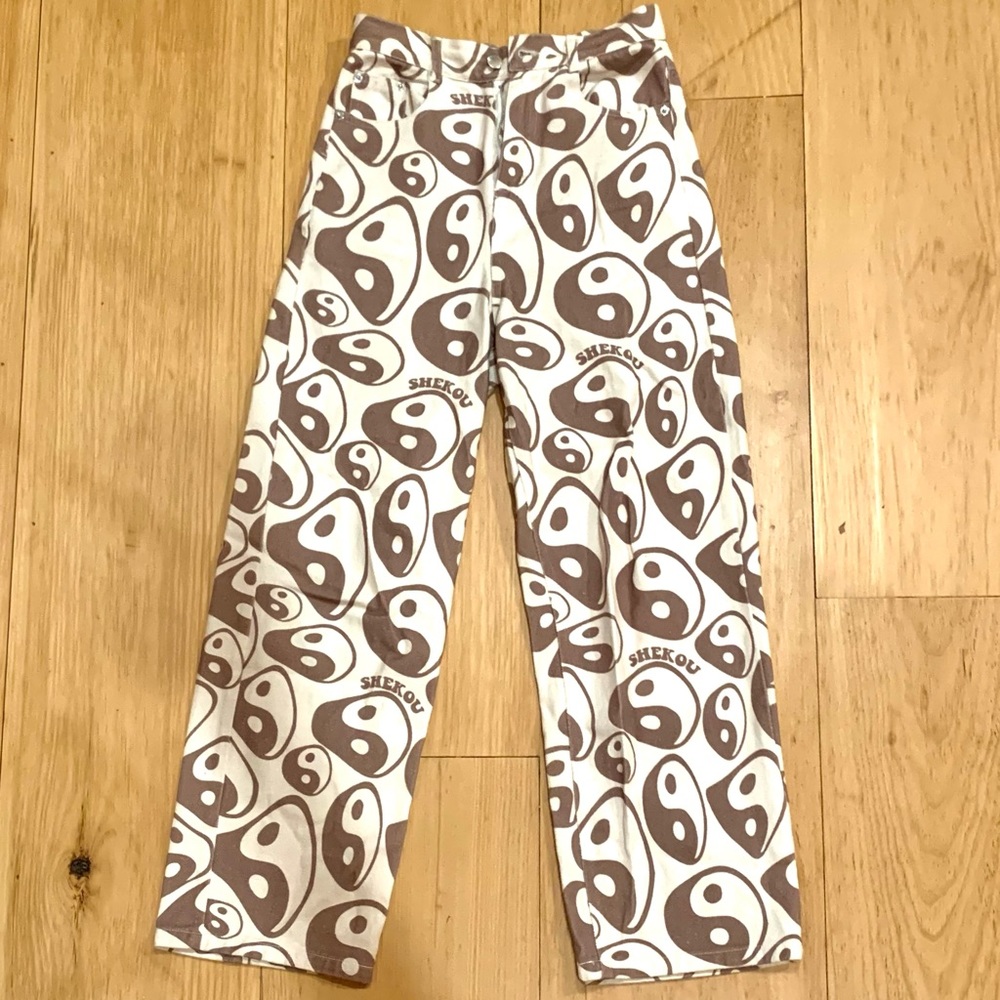 Ying Yang patterned jeans